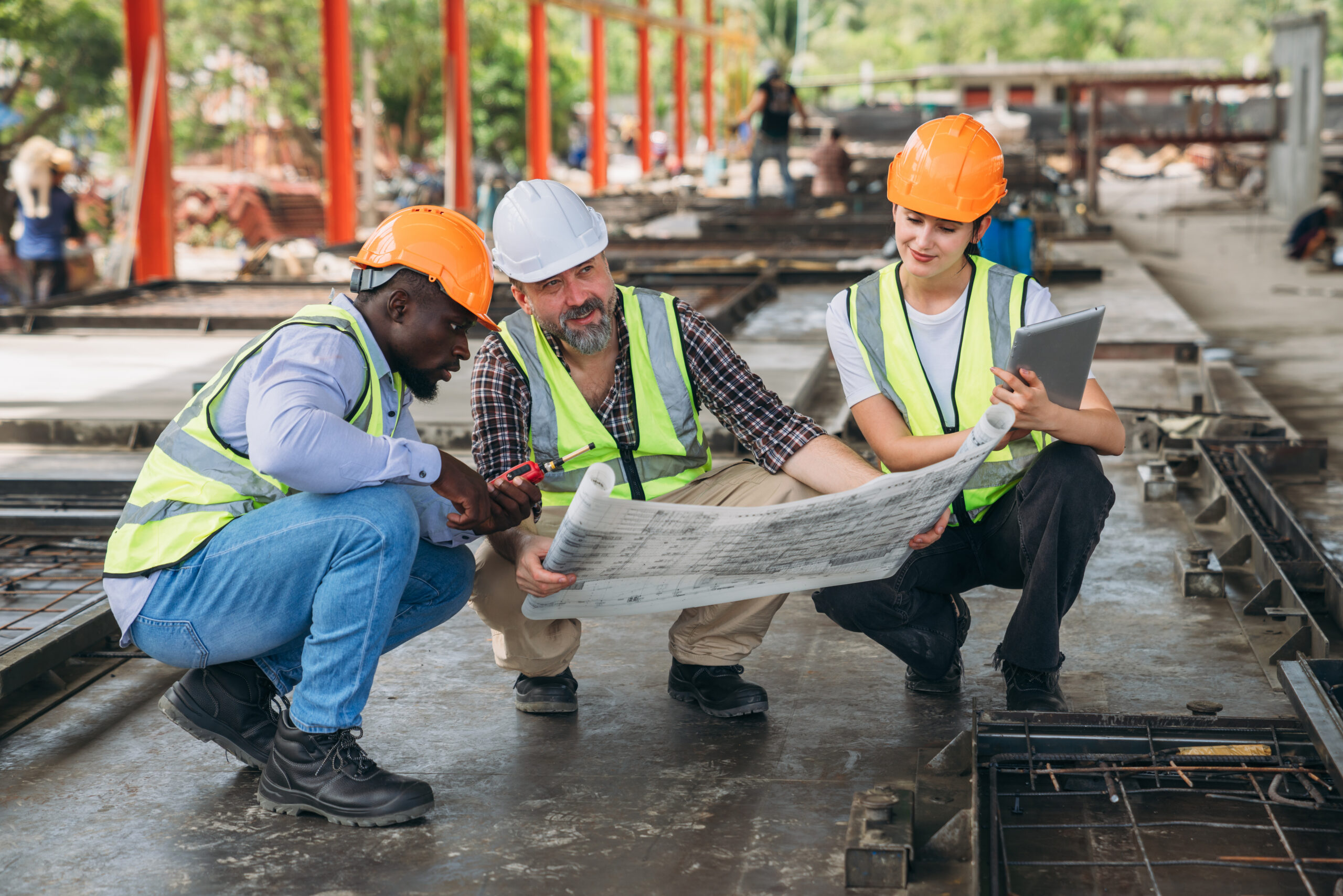 Engineer checking building strength and foundations, showing construction. Worker in construction site.